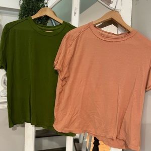 We the free tshirts, green and orange both size S